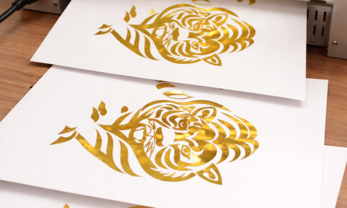 Gold foil tiger stamp in action